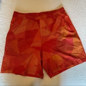 lululemon orange pace breaker short 7in linerless
